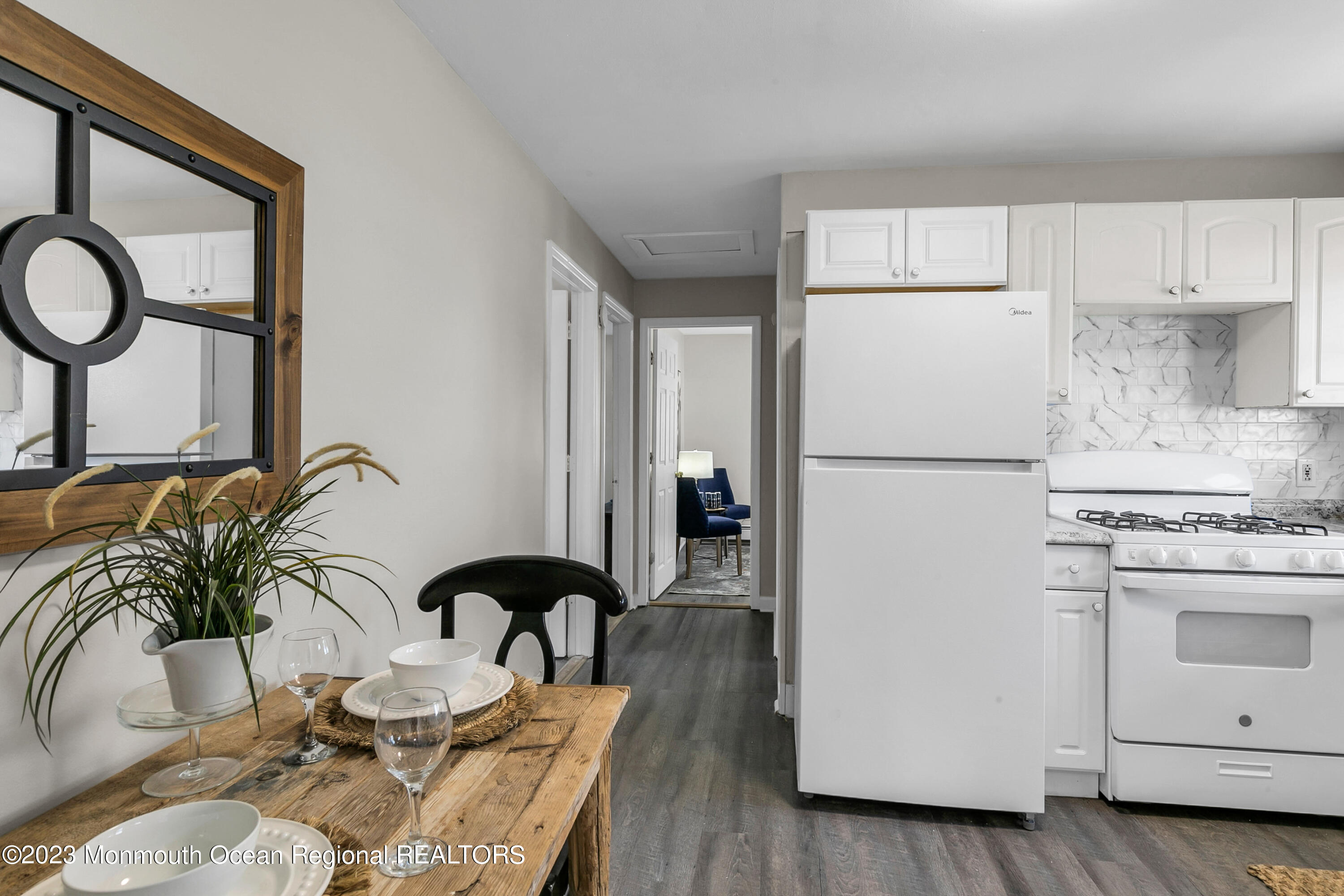 197 Raritan Street Keyport, NJ 07735 - Photo 23 of 28 a kitchen with a refrigerator and a stove top oven