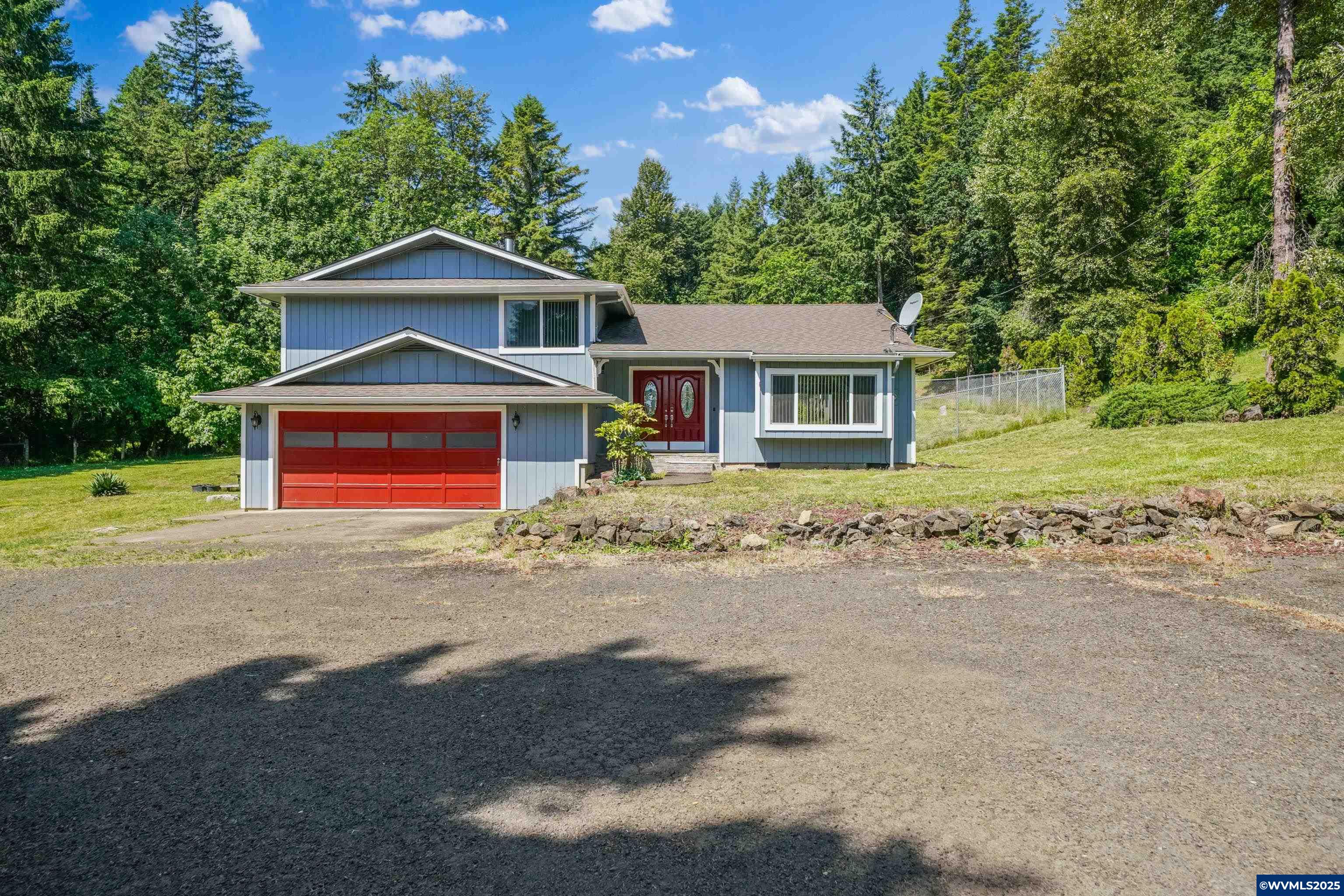 16170 McBee Road Dallas, OR 97338 - Photo 1 of 41 front view of a house with a yard