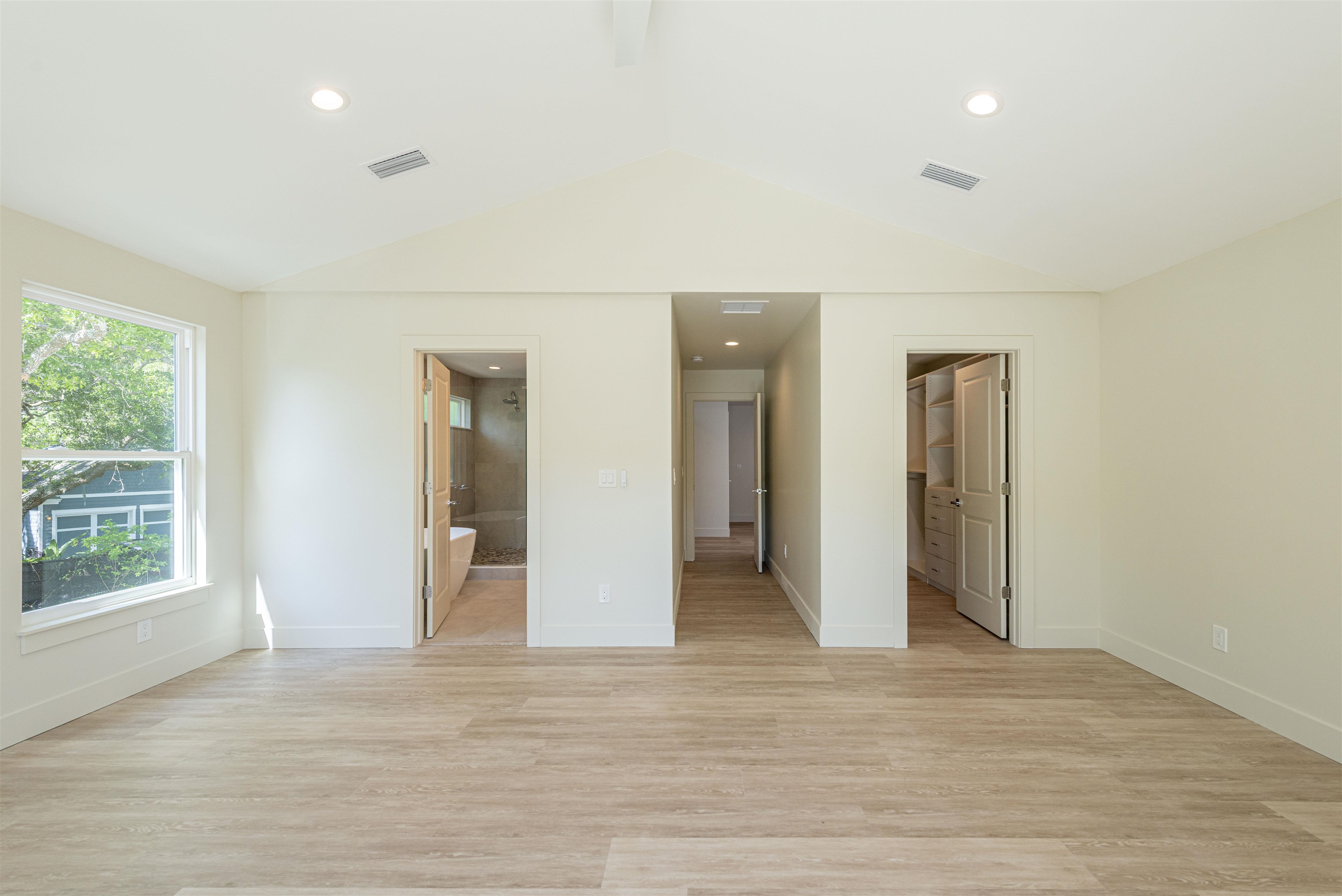 2599 A1A South St. Augustine, FL 32080 - Photo 14 of 17 an empty room with wooden floor and windows