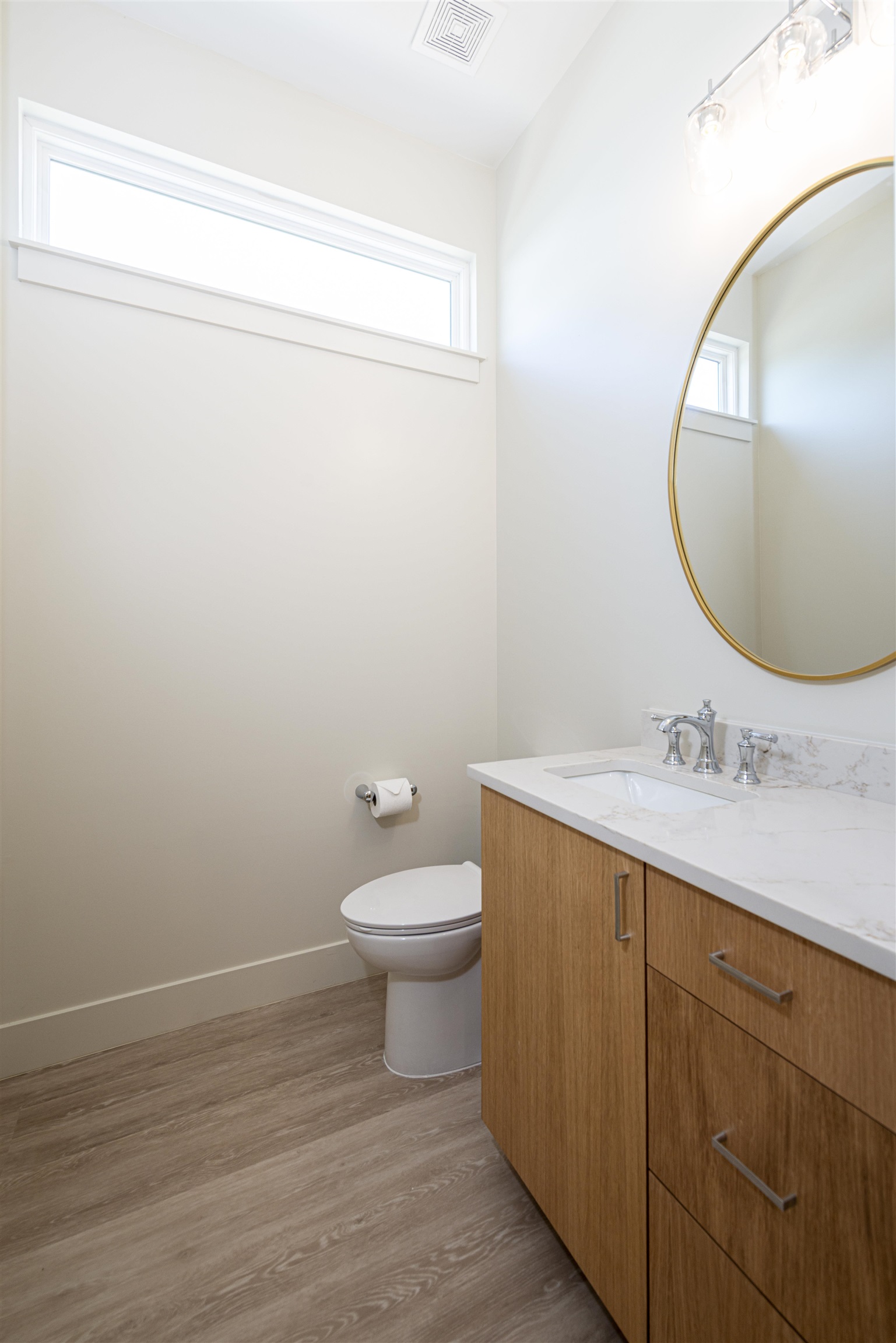 2599 A1A South St. Augustine, FL 32080 - Photo 5 of 17 a bathroom with a toilet a sink and mirror