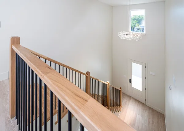 a view of entryway with wooden floor