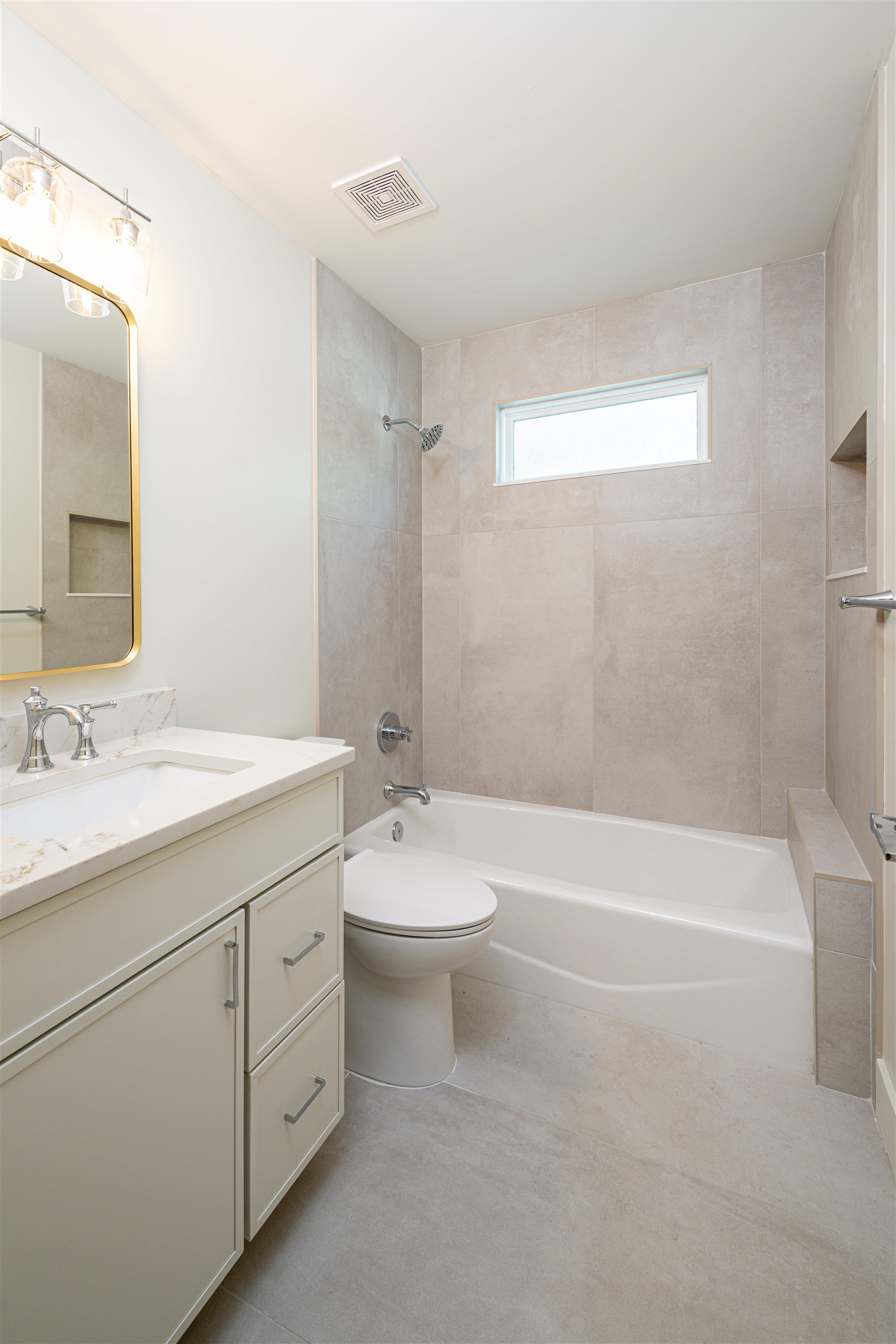 2599 A1A South St. Augustine, FL 32080 - Photo 8 of 17 a bathroom with a granite countertop sink a toilet and bathtub