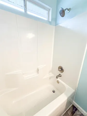 a view of a balcony with an ocean view