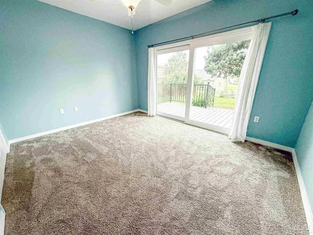 a view of a house with a sink and wooden floor