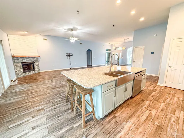 a bathroom with a sink a vanity and a mirror
