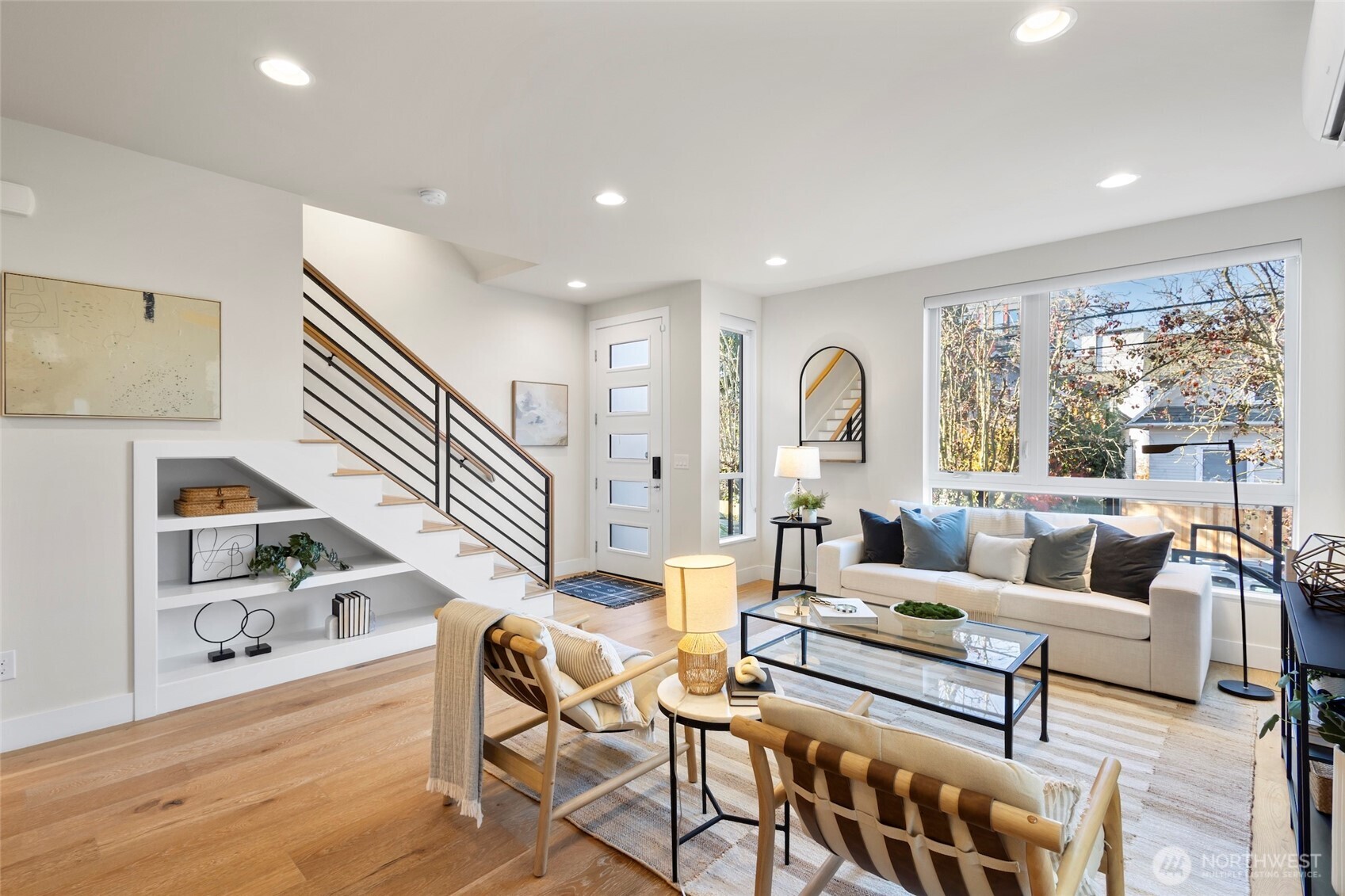 2212 Franklin Avenue East, Unit B Seattle, WA 98102 - Photo 1 of 32 a living room with furniture and a large window
