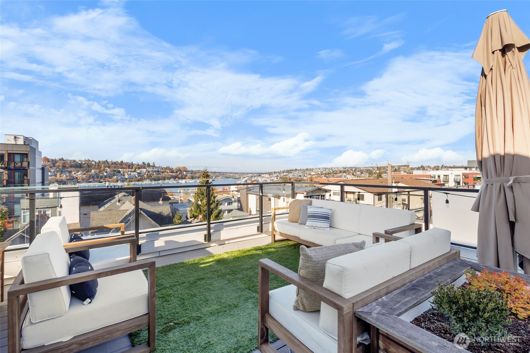 2212 Franklin Avenue East, Unit B Seattle, WA 98102 - Photo 2 of 32 an outdoor view of a garden with lawn chairs
