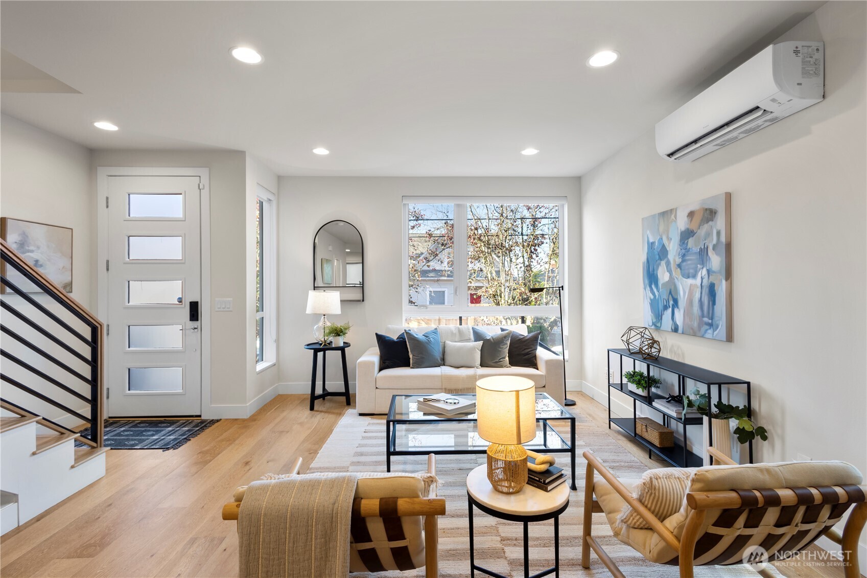 2212 Franklin Avenue East, Unit B Seattle, WA 98102 - Photo 3 of 32 a living room with furniture and a large window