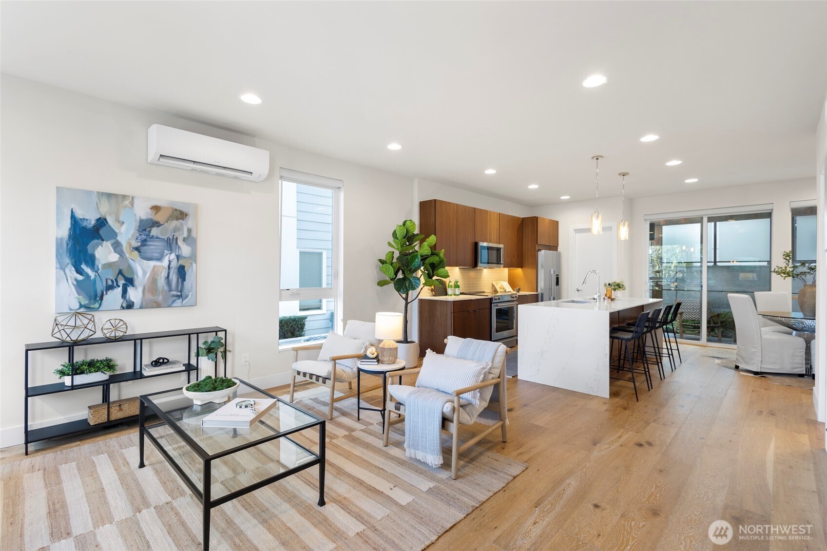 2212 Franklin Avenue East, Unit B Seattle, WA 98102 - Photo 4 of 32 a living room with furniture and a wooden floor