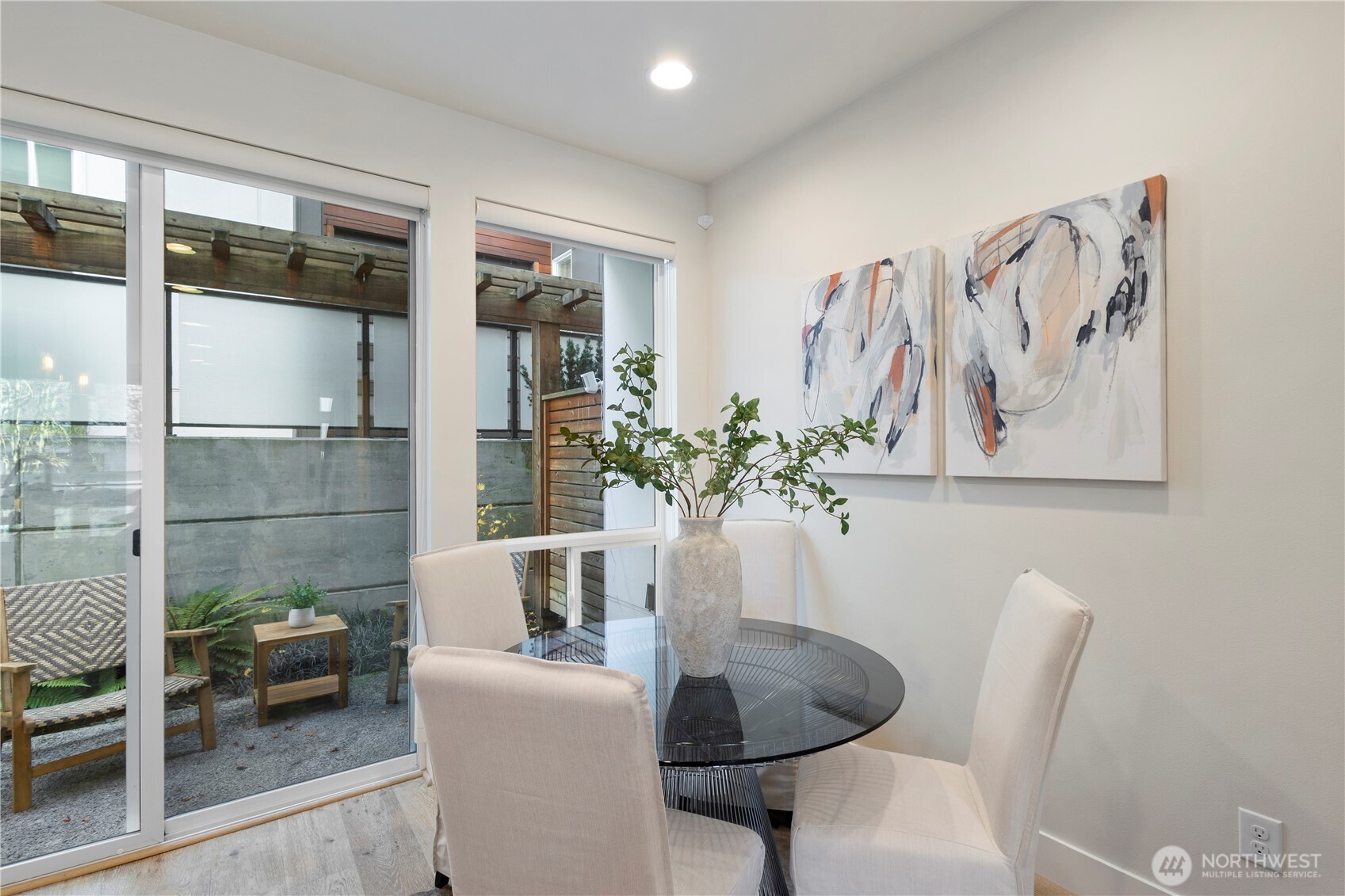2212 Franklin Avenue East, Unit B Seattle, WA 98102 - Photo 7 of 32 a dining room with furniture and window