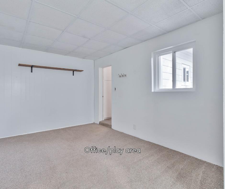 5856 East Park Cir Drive Fresno, CA 93727 - Photo 14 of 47 a view of a room that has a window in it