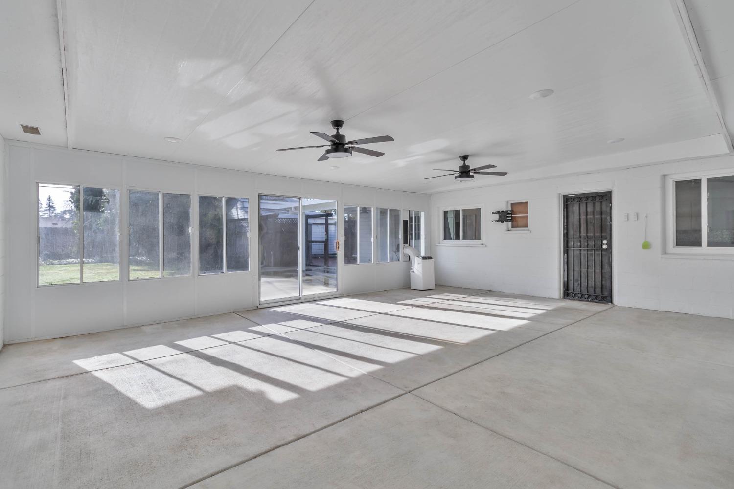 5856 East Park Cir Drive Fresno, CA 93727 - Photo 32 of 47 a view of an empty room with a window