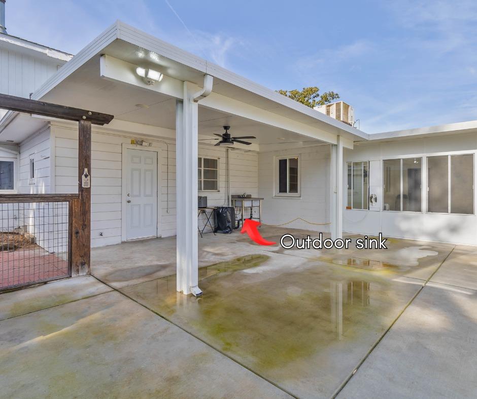 5856 East Park Cir Drive Fresno, CA 93727 - Photo 35 of 47 a view of a house with a garage