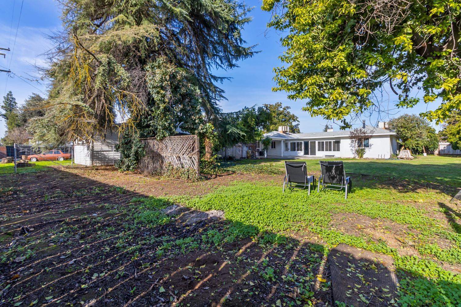 5856 East Park Cir Drive Fresno, CA 93727 - Photo 45 of 47 a view of a house with backyard and sitting area