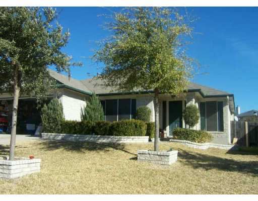 1044 Kirtomy Loop Pflugerville, TX 78660 - Photo 1 of 1 front view of a house with a yard