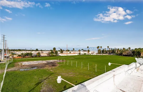 a view of a golf course with a lake