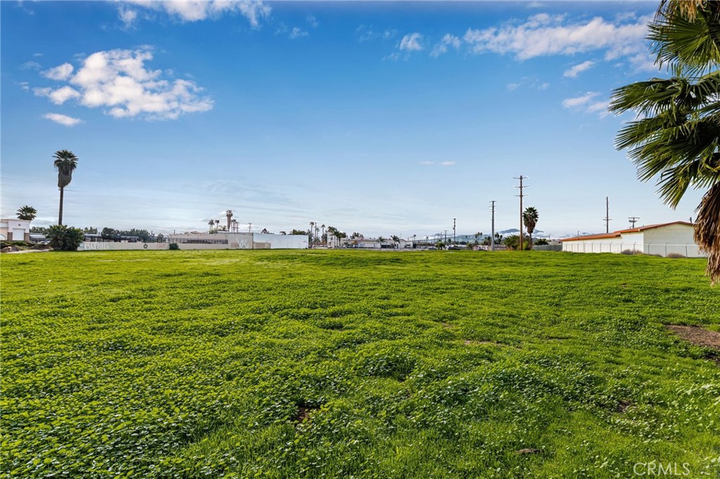 7509 Arlington Riverside, CA 92503 - Photo 6 of 27 a view of pool with outdoor seating and yard
