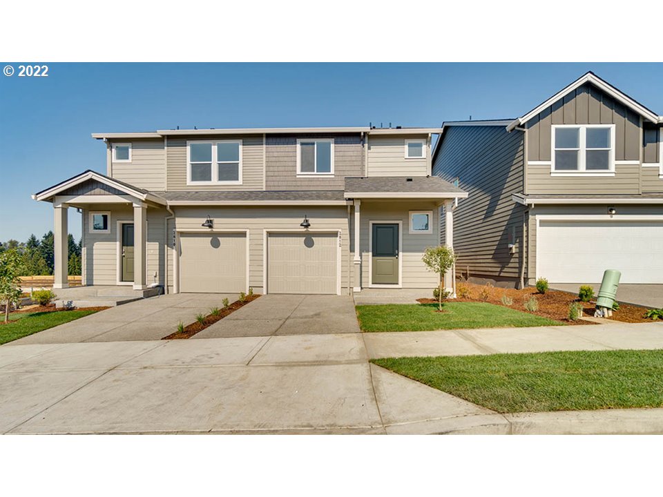 2810 North 3rd Way Ridgefield, WA 98642 - Photo 1 of 20 a house view with a garden space