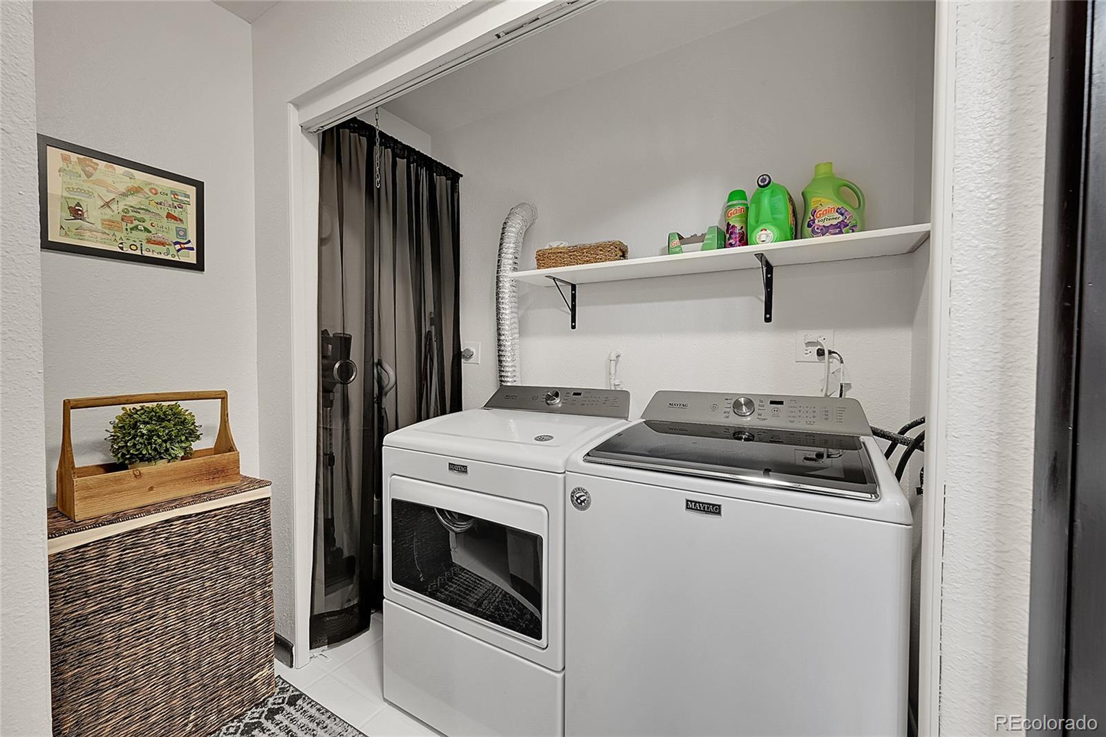 8959 South Hillview Road Morrison, CO 80465 - Photo 31 of 49 a utility room with dryer and washer