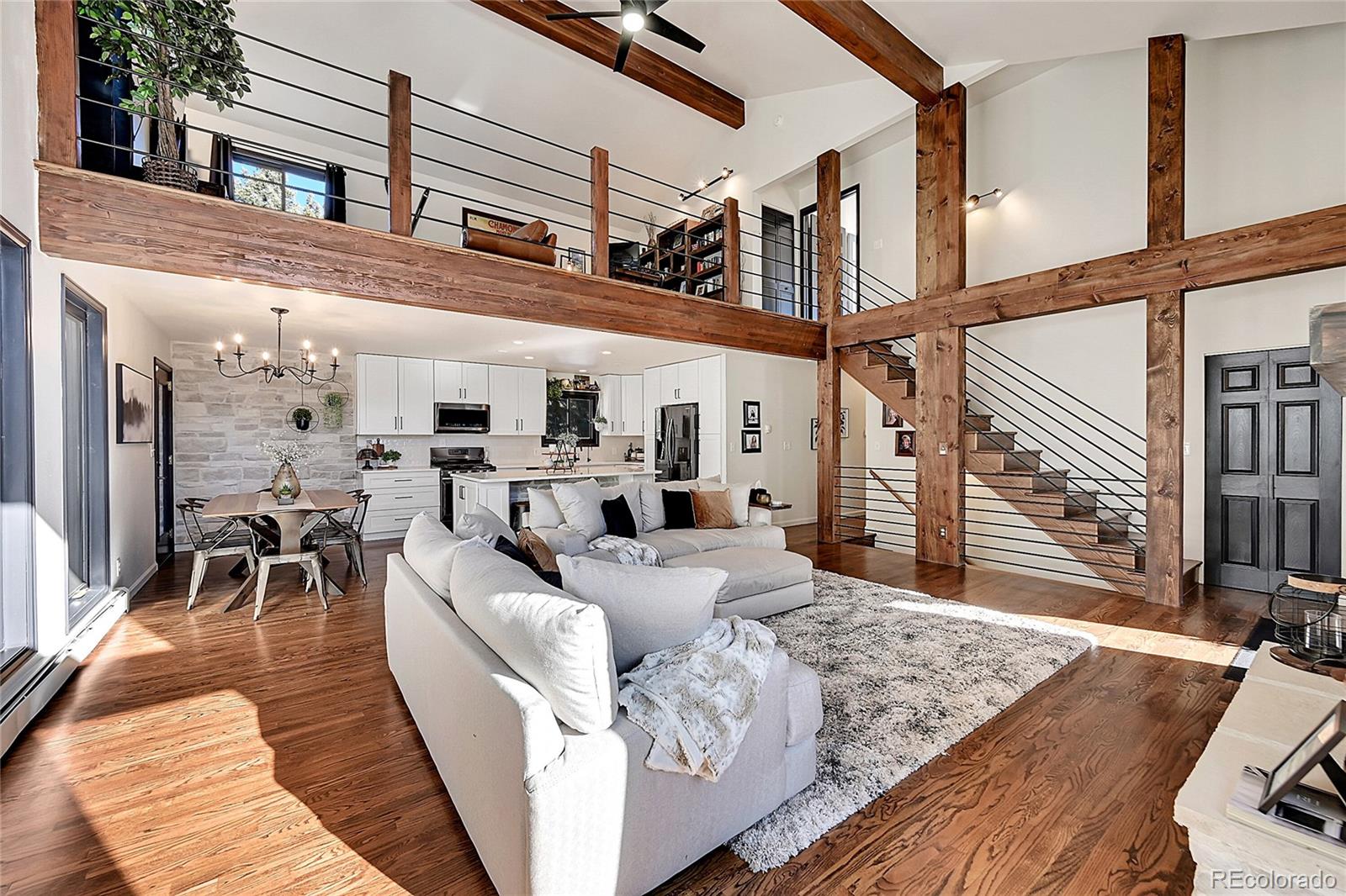 8959 South Hillview Road Morrison, CO 80465 - Photo 4 of 49 a view of a livingroom with furniture and a rug