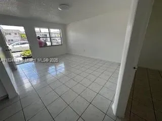 en empty room with windows