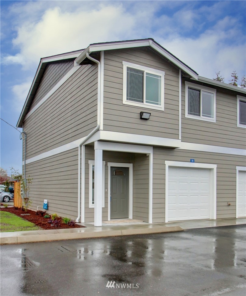 705 Peterson Road Burlington, WA 98233 - Photo 2 of 30 a front view of a house with a garage