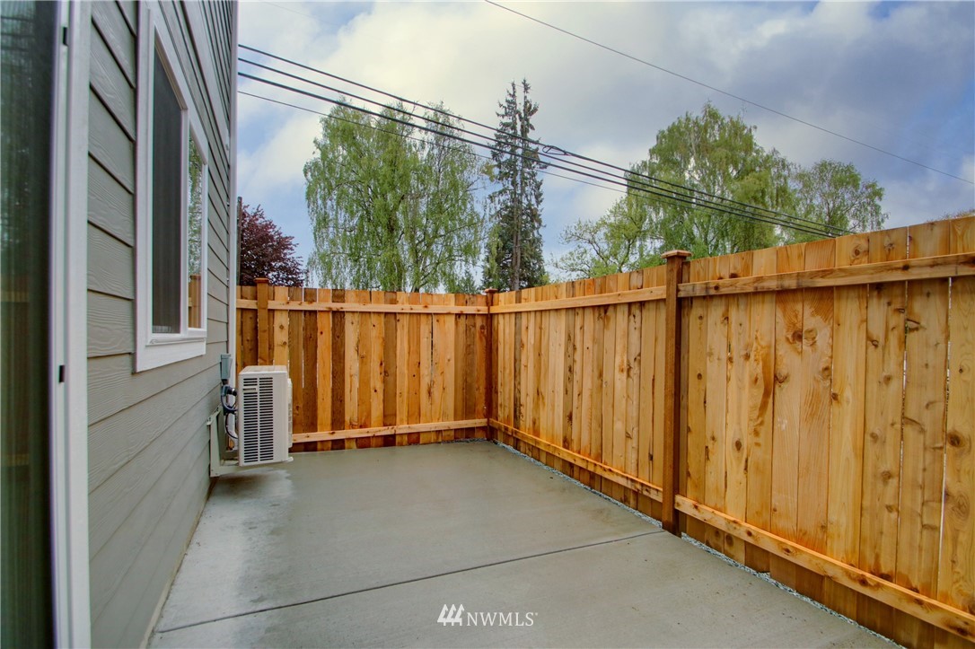 705 Peterson Road Burlington, WA 98233 - Photo 13 of 30 a view of a house with a wooden fence