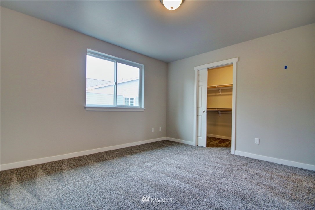 705 Peterson Road Burlington, WA 98233 - Photo 20 of 30 an empty room with windows and closet