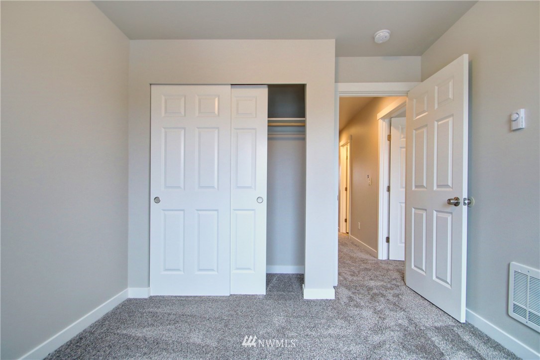 705 Peterson Road Burlington, WA 98233 - Photo 26 of 30 an empty room with windows and closet