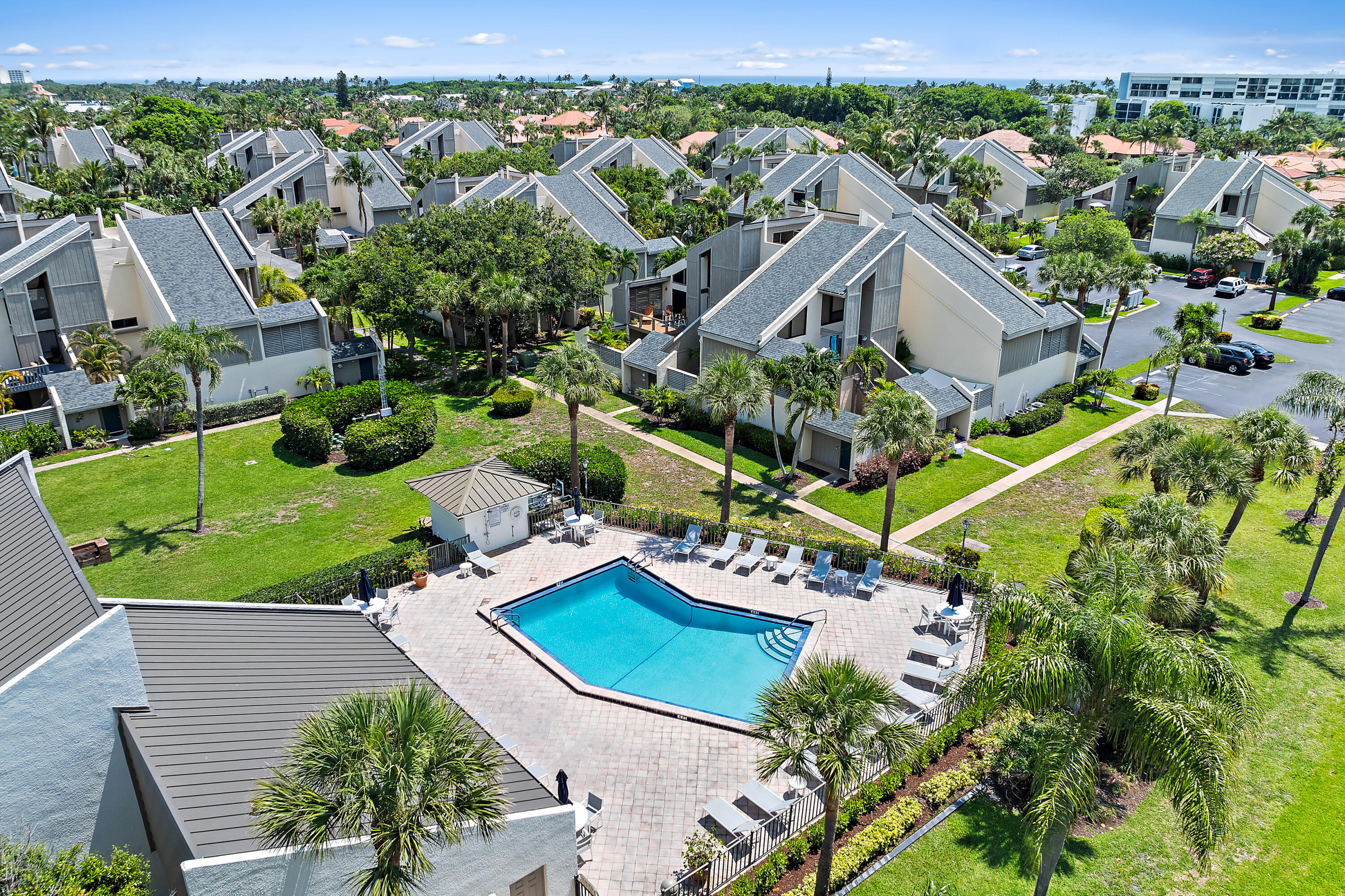 an aerial view of residential house with an outdoor space