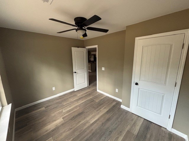 732 Moye Road Columbus, GA 31907 - Photo 5 of 10 a view of empty room with wooden floor and fan