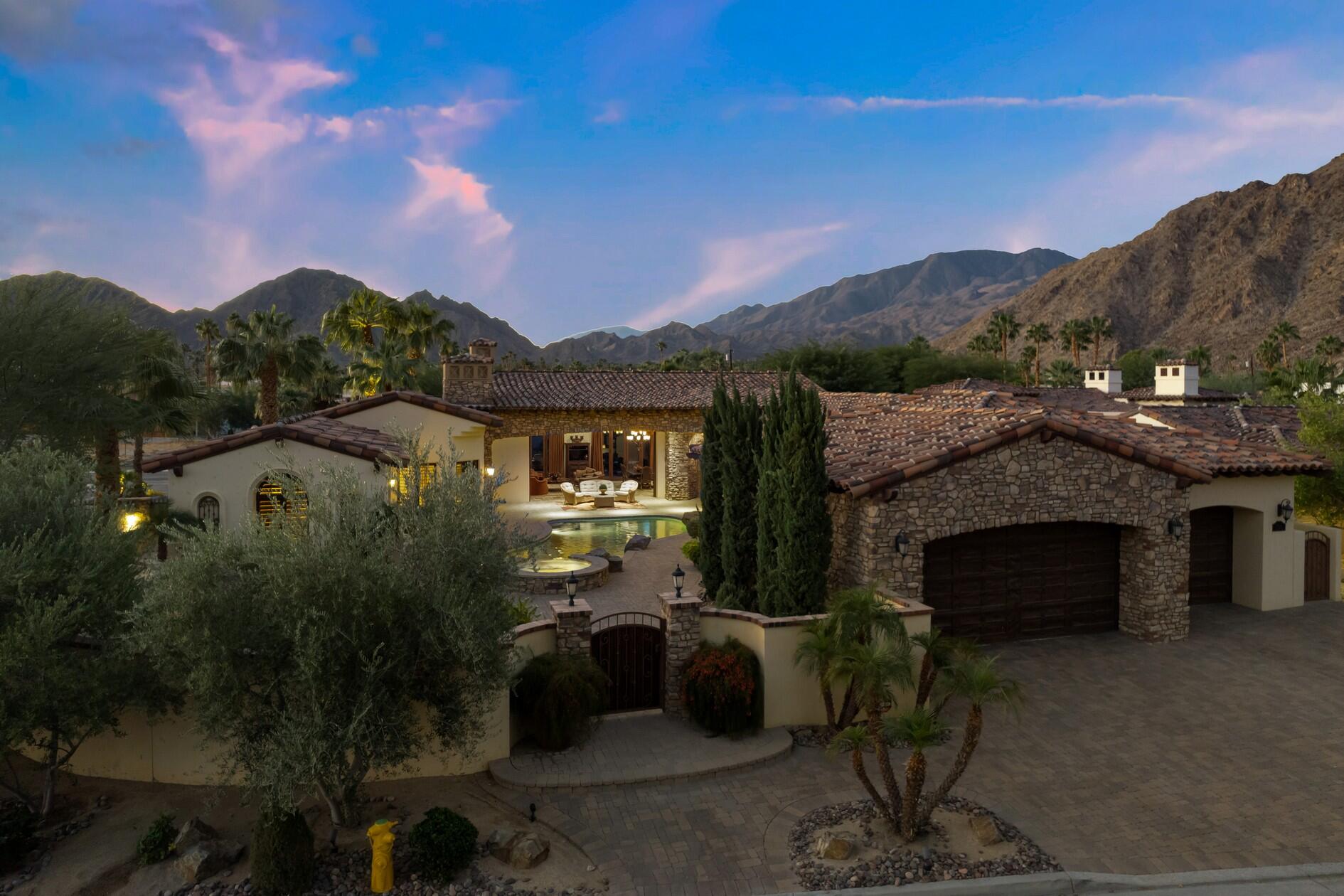 77169 Casa Del Sol La Quinta, CA 92253 - Photo 1 of 50 a view of balcony with furniture and a fireplace