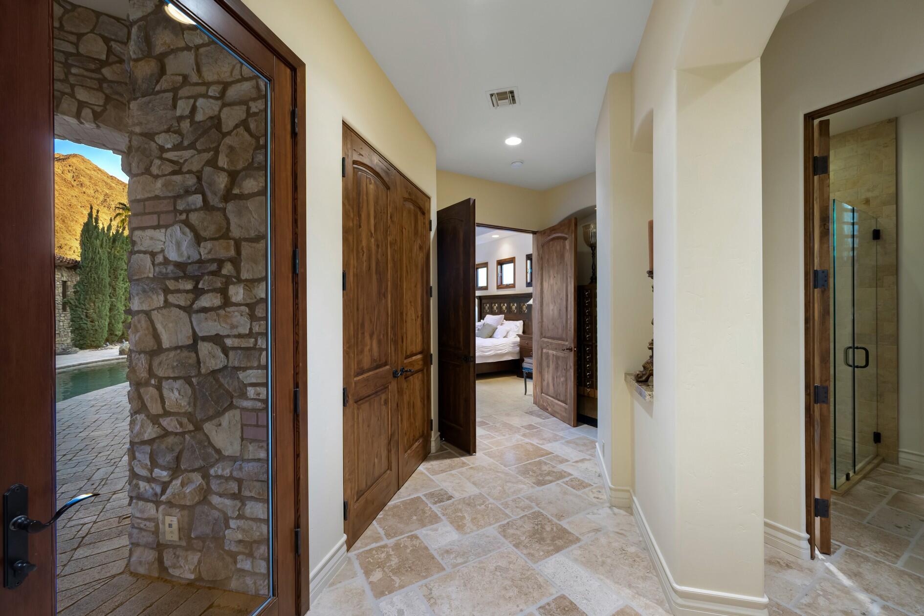 77169 Casa Del Sol La Quinta, CA 92253 - Photo 16 of 50 a view of entryway with a hallway