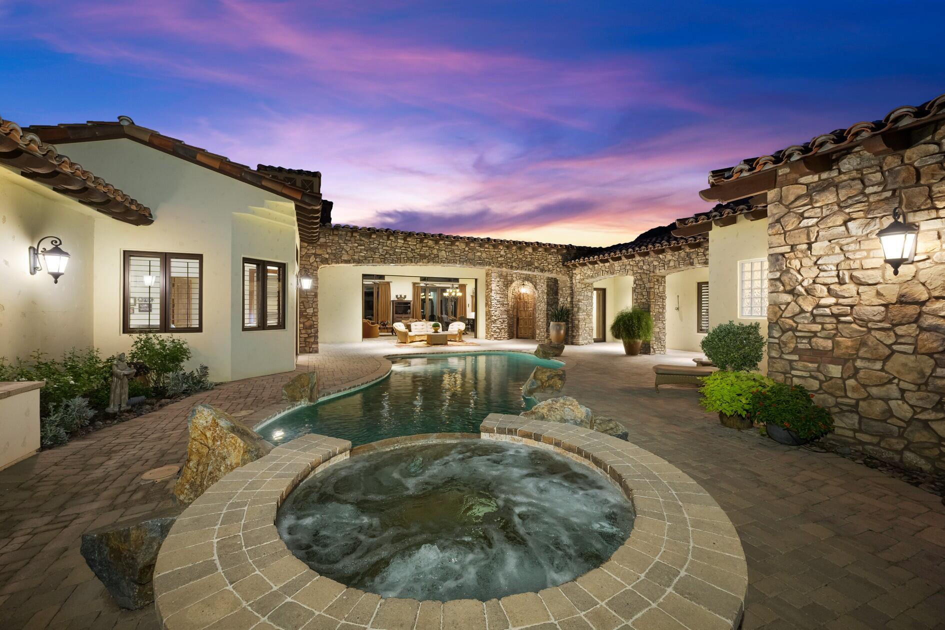 77169 Casa Del Sol La Quinta, CA 92253 - Photo 3 of 50 a view of a house with a yard