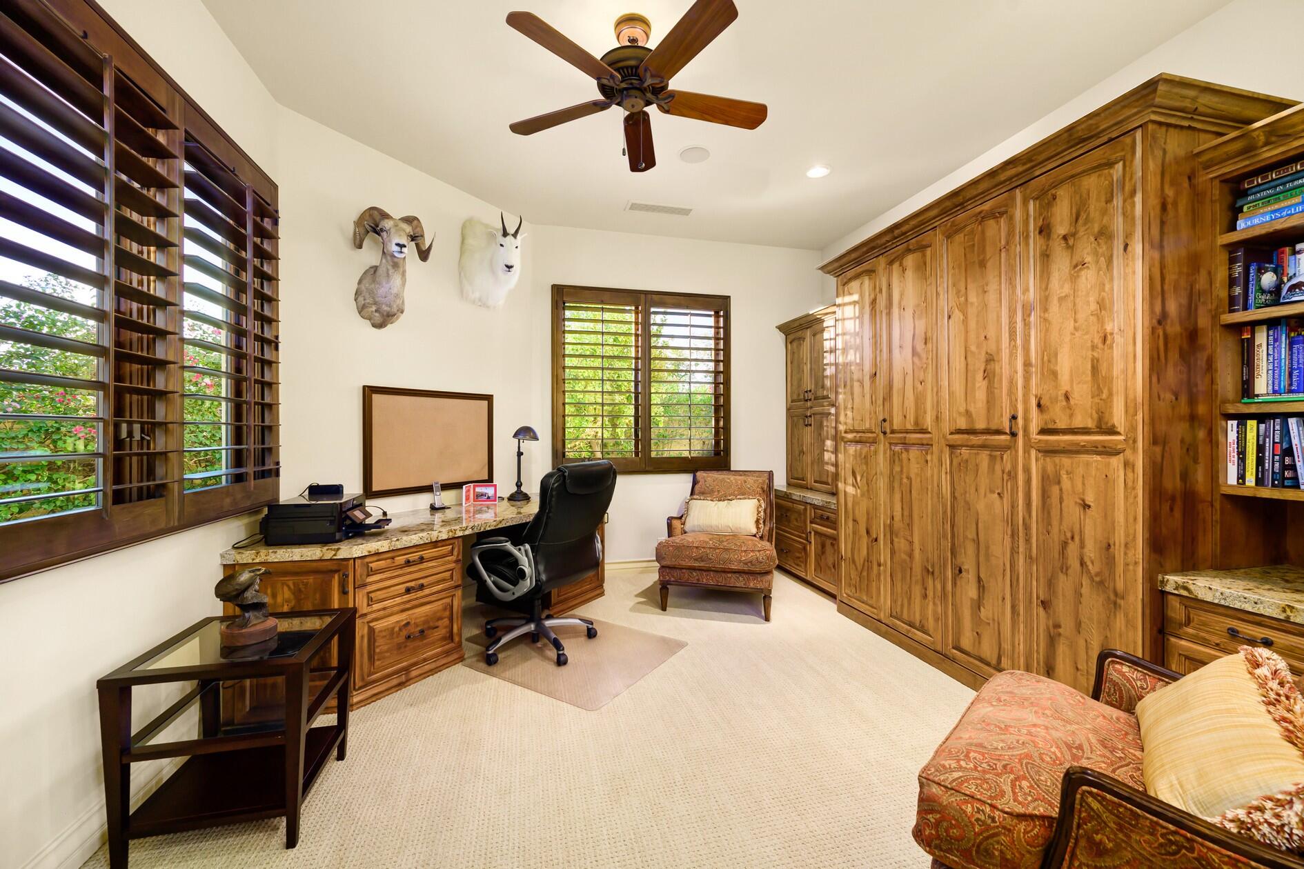 77169 Casa Del Sol La Quinta, CA 92253 - Photo 22 of 50 a view of a livingroom with workspace and a window