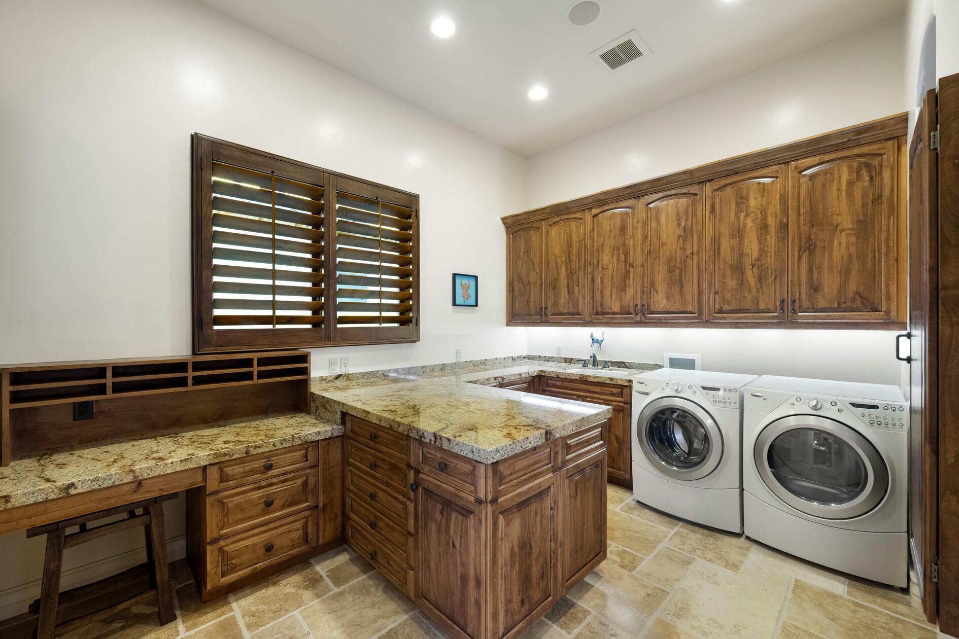 77169 Casa Del Sol La Quinta, CA 92253 - Photo 29 of 50 a utility room with washer and dryer