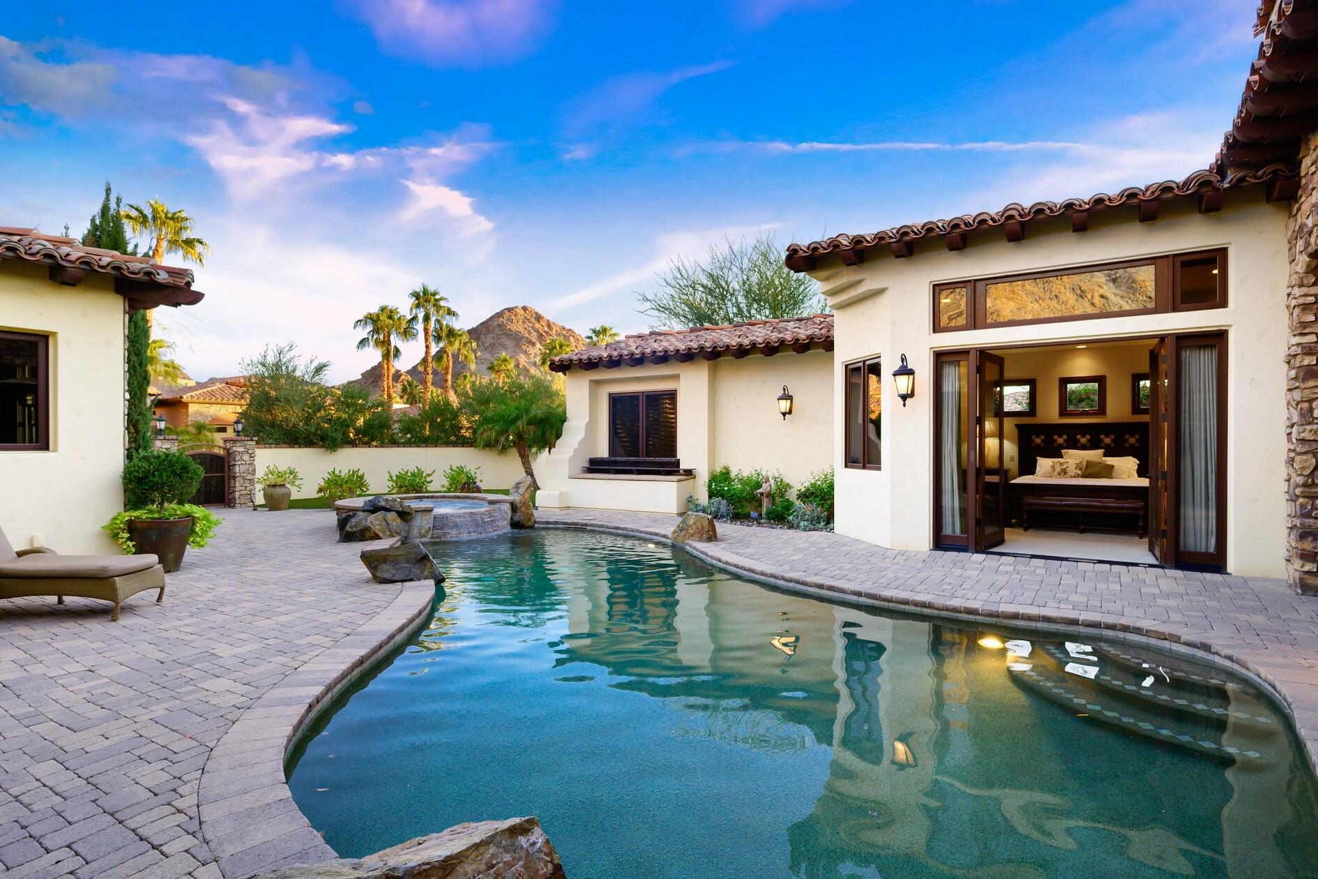 77169 Casa Del Sol La Quinta, CA 92253 - Photo 30 of 50 a swimming pool with outdoor seating