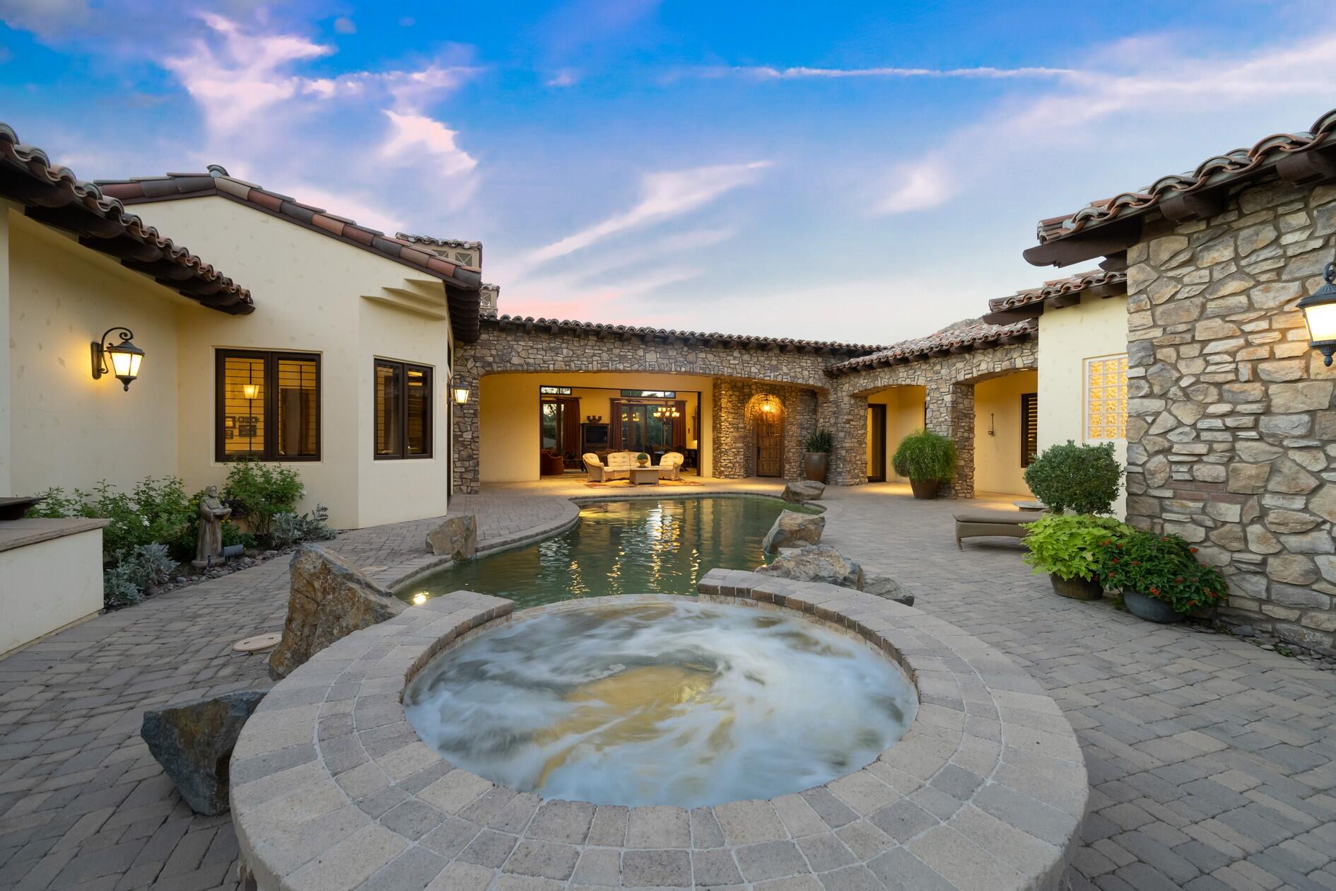 77169 Casa Del Sol La Quinta, CA 92253 - Photo 34 of 50 a view of a house with couches in patio