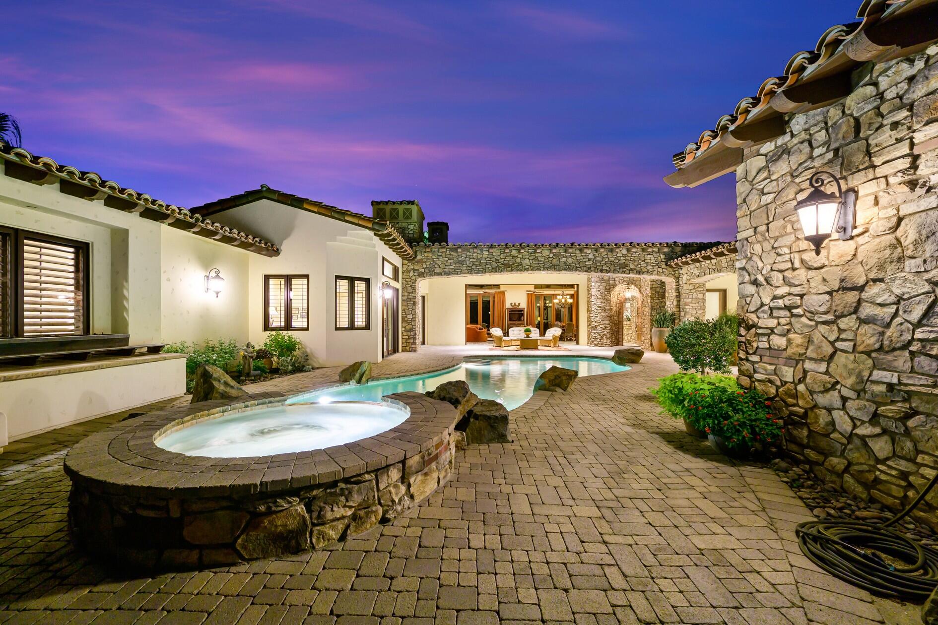 77169 Casa Del Sol La Quinta, CA 92253 - Photo 35 of 50 a front view of a house with a yard