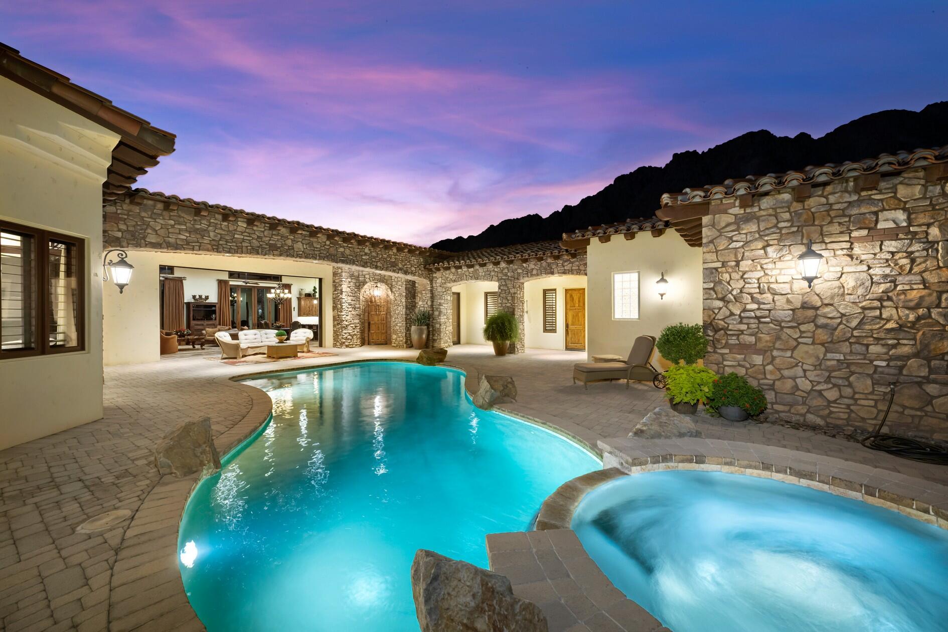 77169 Casa Del Sol La Quinta, CA 92253 - Photo 36 of 50 a view of a house with swimming pool and sitting area