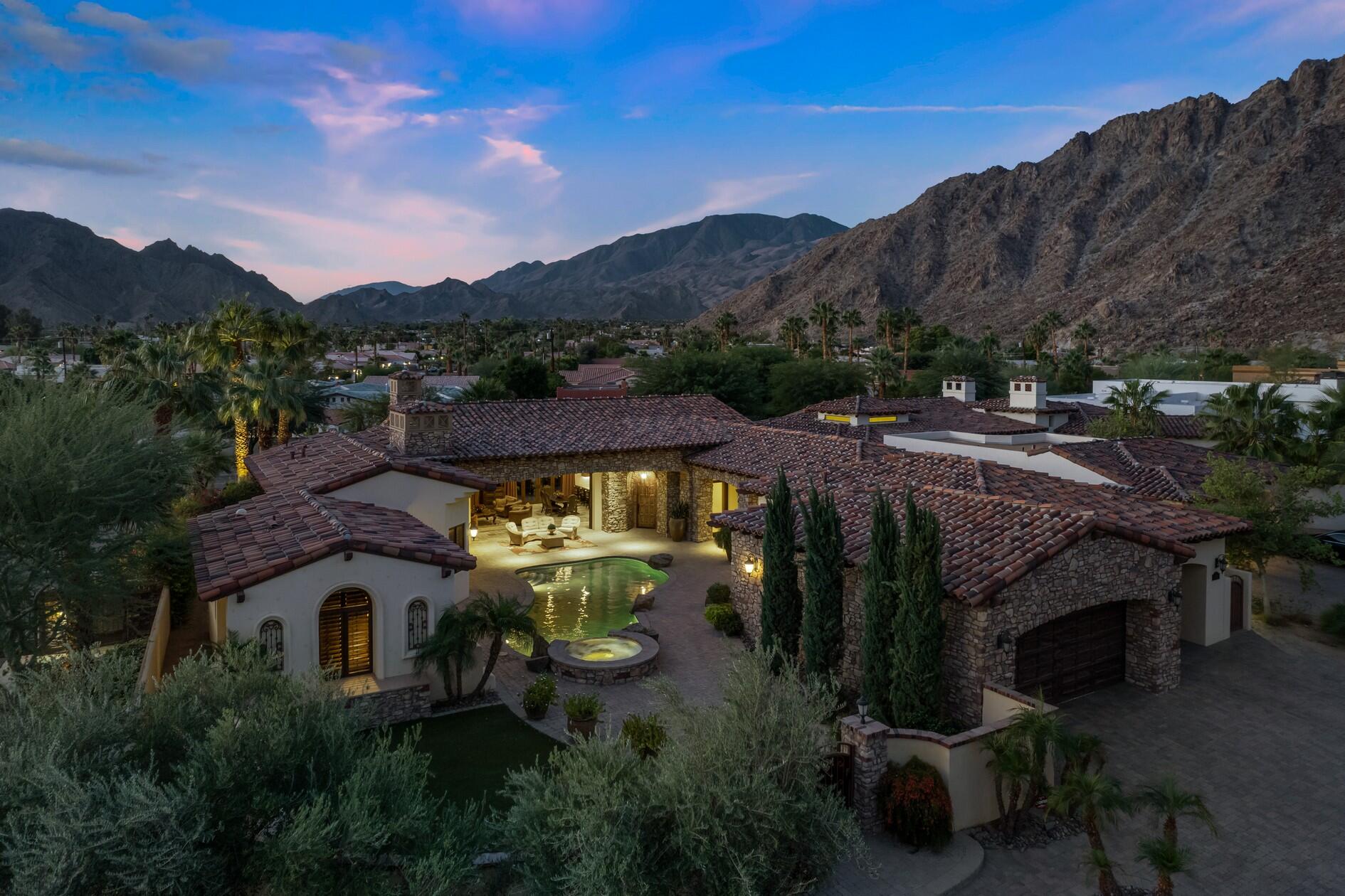 77169 Casa Del Sol La Quinta, CA 92253 - Photo 46 of 50 an aerial view of a house with a garden view