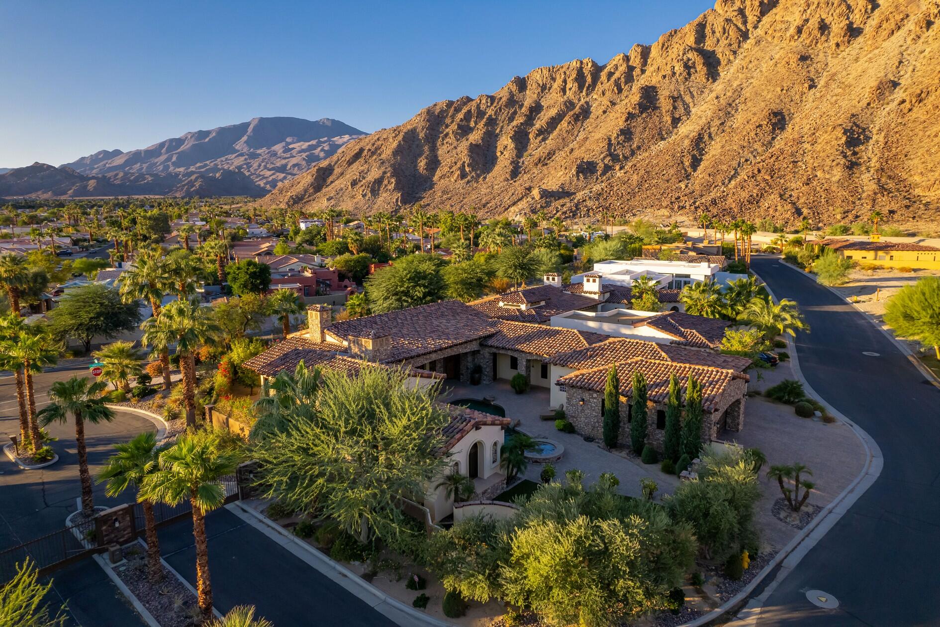 77169 Casa Del Sol La Quinta, CA 92253 - Photo 48 of 50 a view of swimming pool with outdoor seating and mountain view in back