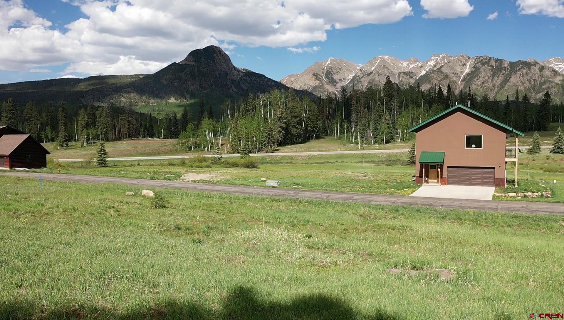 12 Meadow Circle Durango, CO 81301 - Photo 12 of 13 a front view of a house with a yard