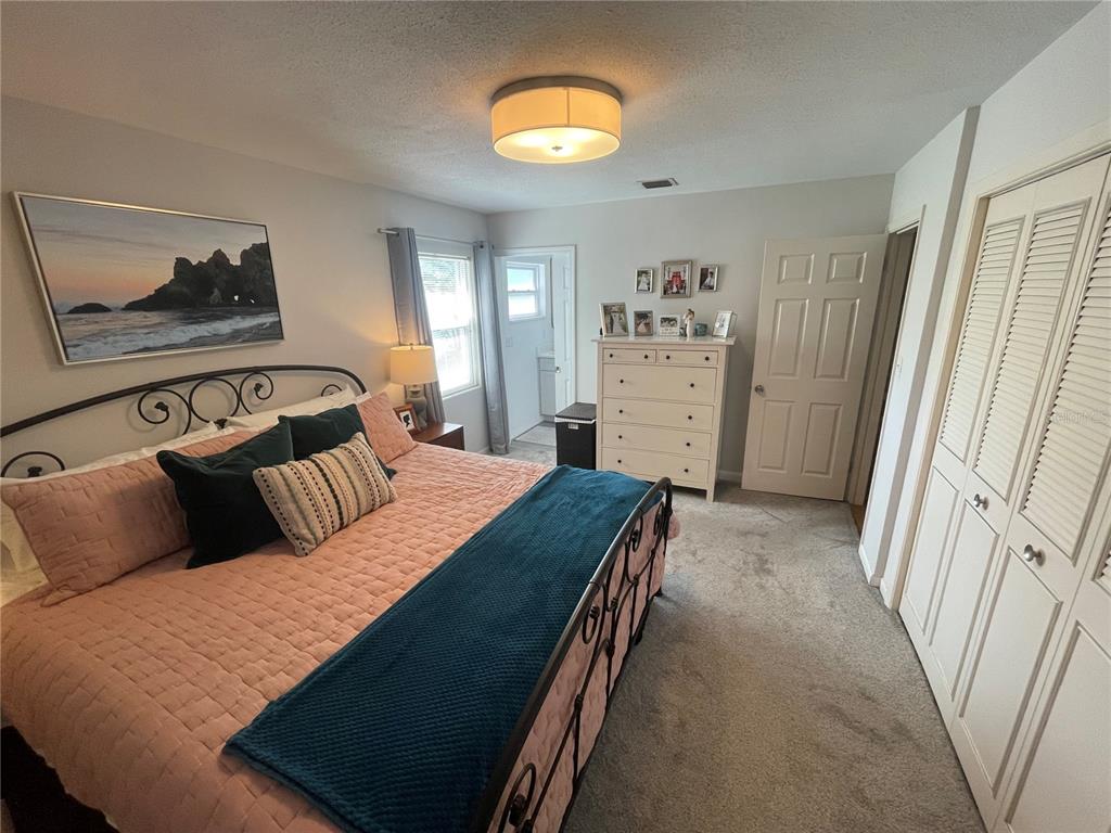 714 Denton Road Winter Park, FL 32792 - Photo 20 of 32 a bedroom with a bed and a window