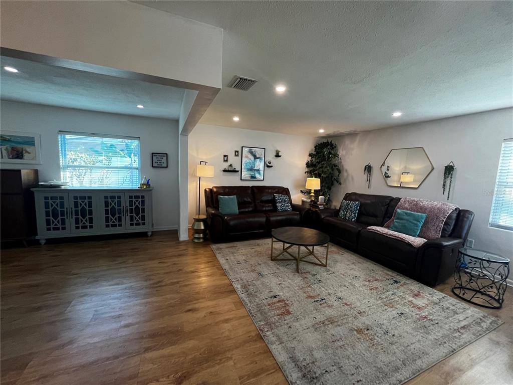 714 Denton Road Winter Park, FL 32792 - Photo 4 of 32 a living room with furniture and a fireplace