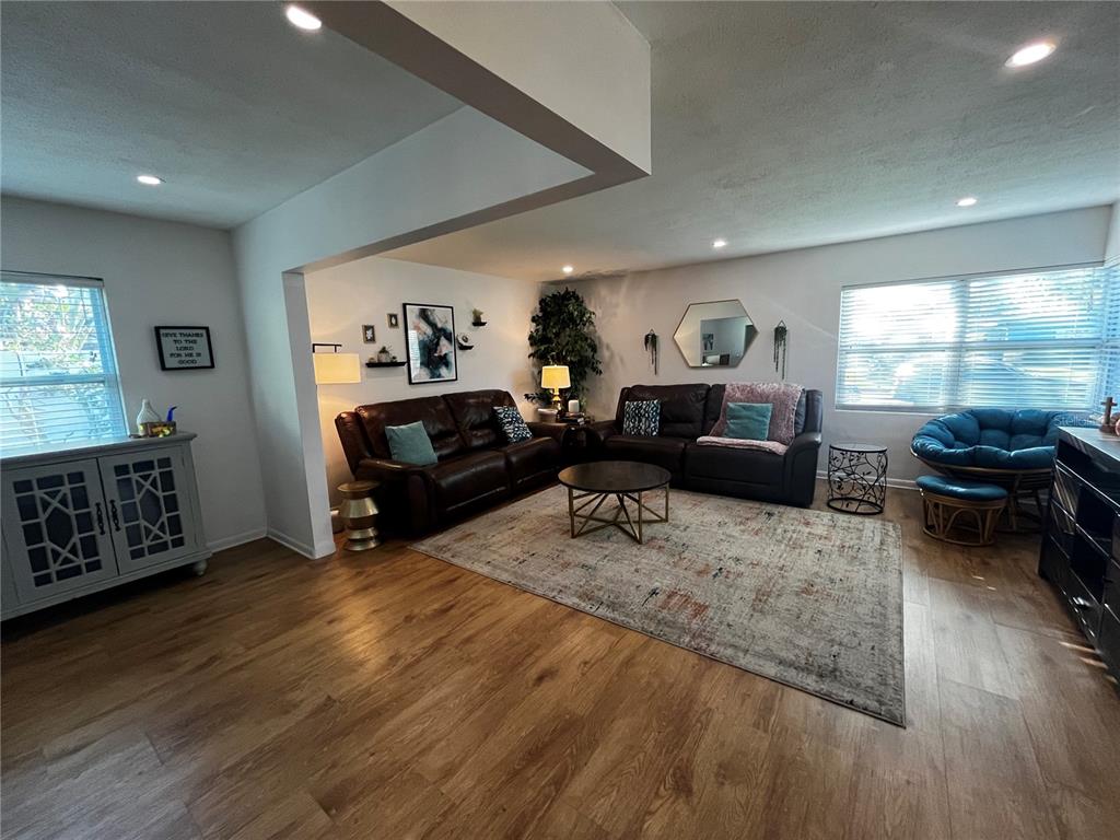 714 Denton Road Winter Park, FL 32792 - Photo 7 of 32 a living room with furniture and a wooden floor