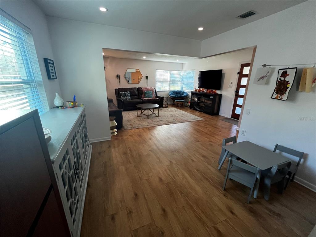 714 Denton Road Winter Park, FL 32792 - Photo 8 of 32 a living room with furniture and a flat screen tv