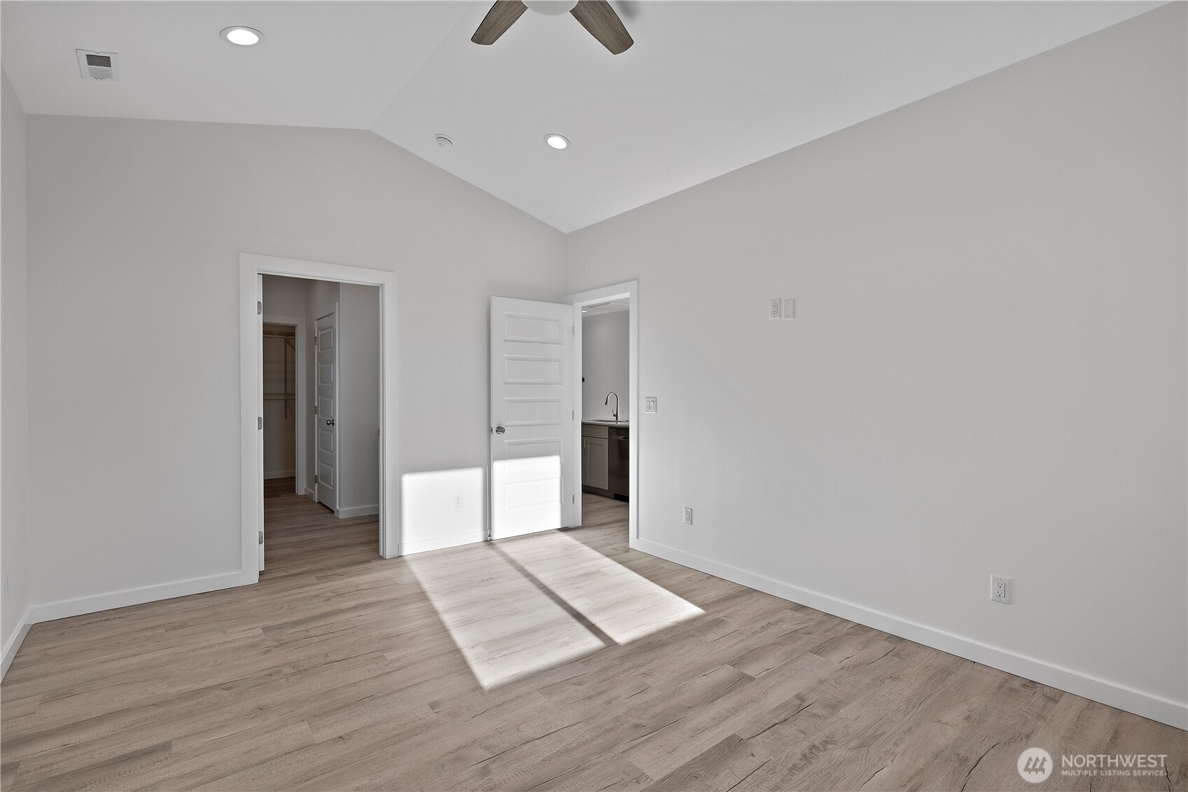 608 4th Street Mattawa, WA 99349 - Photo 13 of 40 wooden floor in an empty room with a window