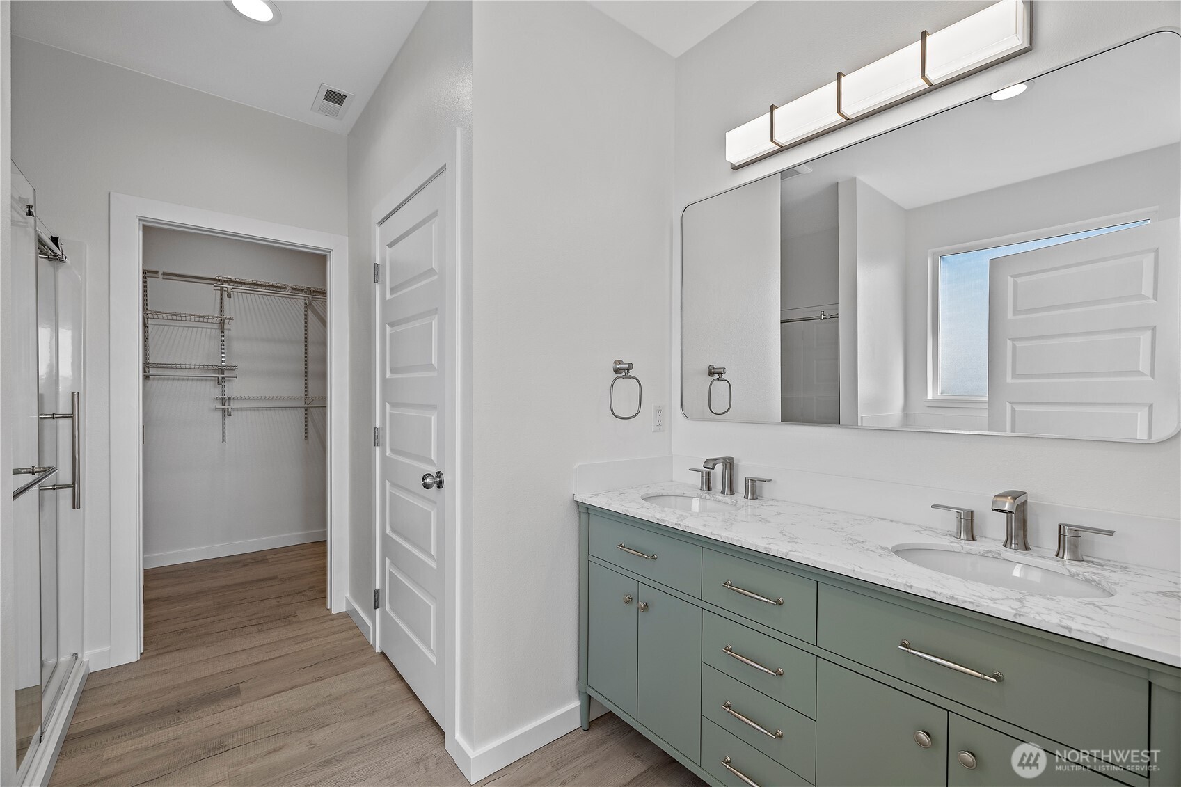 608 4th Street Mattawa, WA 99349 - Photo 14 of 40 a en suite bathroom with a granite countertop sink and a mirror