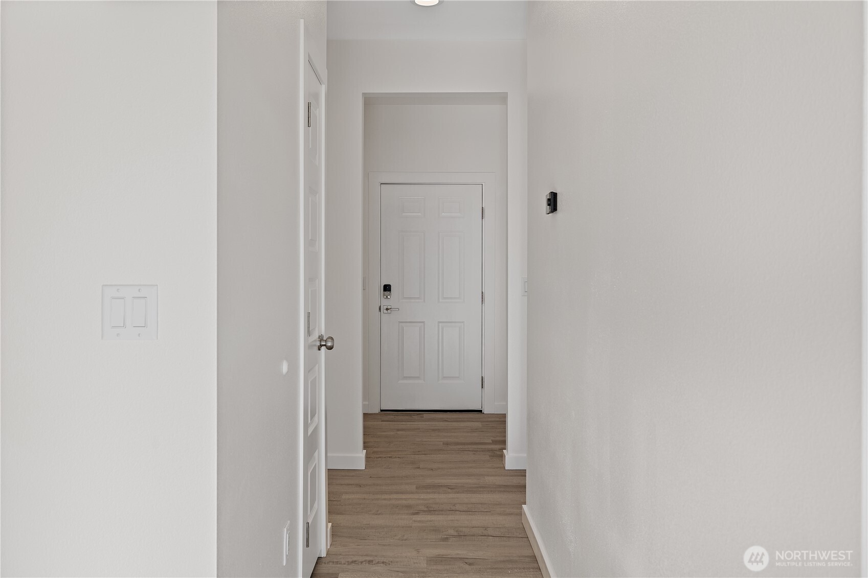 608 4th Street Mattawa, WA 99349 - Photo 17 of 40 a view of a hallway with wooden floor